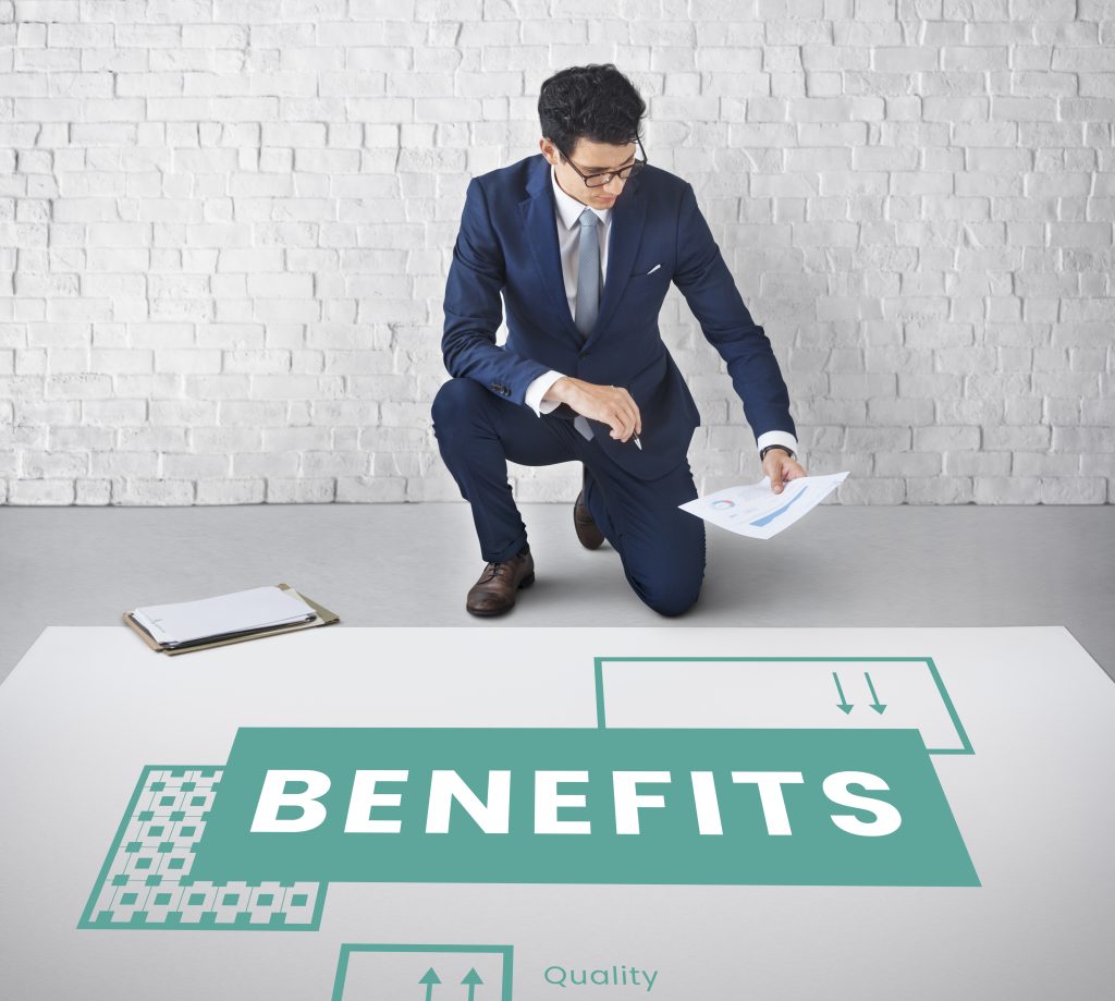 Photo of a man kneeling above the word benefits