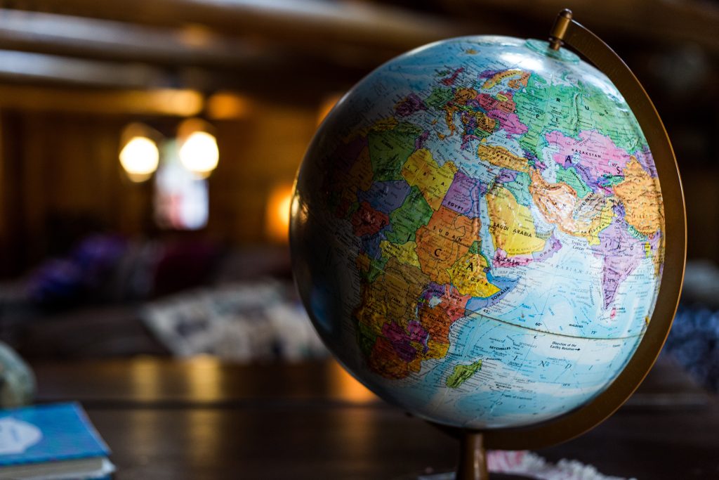 Globe that represents the whole world you can reach with international SMS marketing.